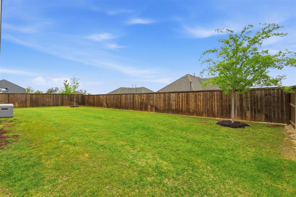 11116 Emory Oak Ridge Flower Mound, TX 76226 - Photo 32 of 40 a view of an outdoor space and yard