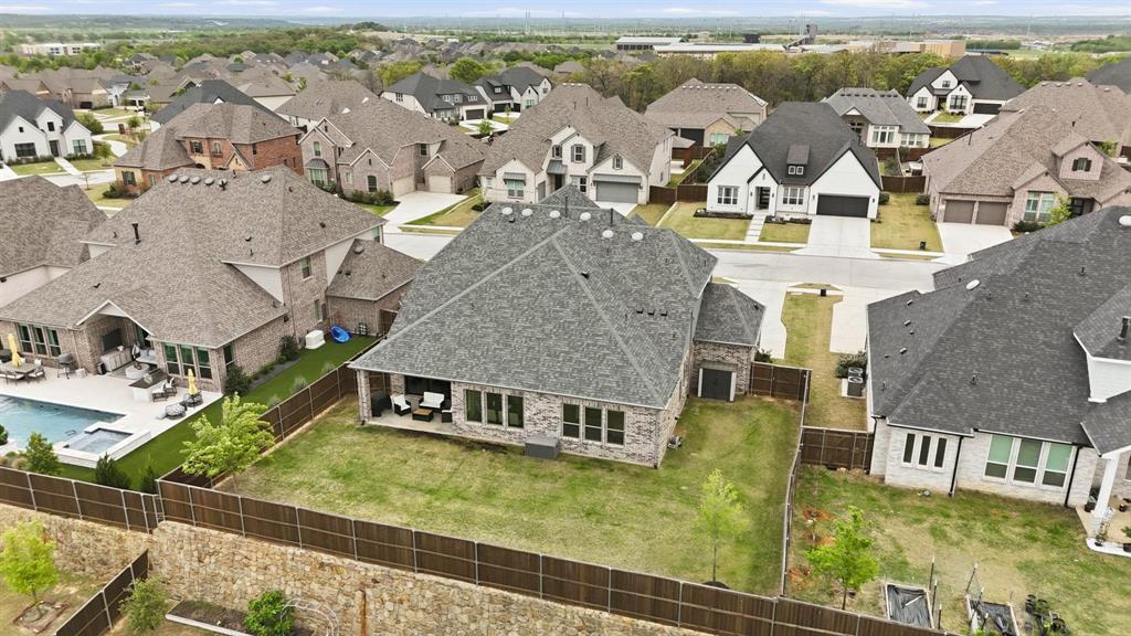 11116 Emory Oak Ridge Flower Mound, TX 76226 - Photo 35 of 40 an aerial view of residential houses with outdoor space