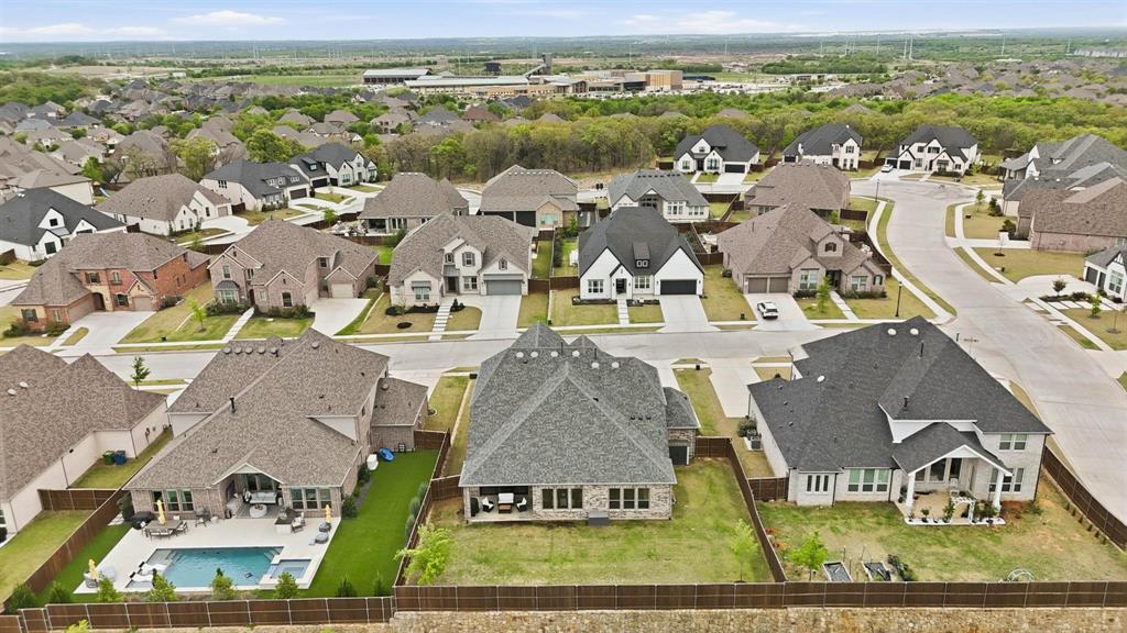 11116 Emory Oak Ridge Flower Mound, TX 76226 - Photo 36 of 40 an aerial view of residential building with outdoor space