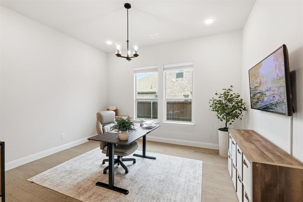 11116 Emory Oak Ridge Flower Mound, TX 76226 - Photo 6 of 40 a view of a livingroom with furniture and a window