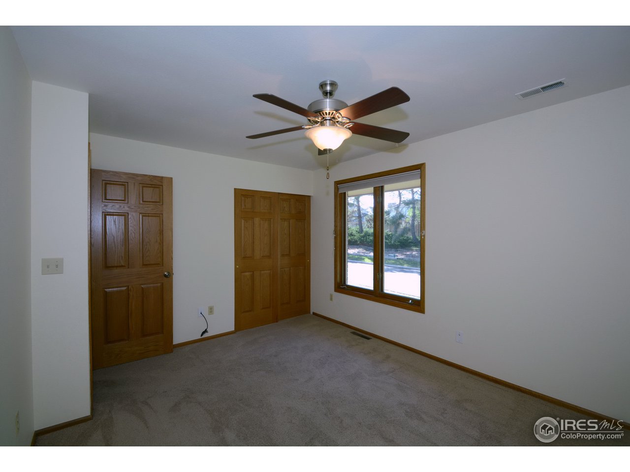 7135 Lookout Road Longmont, CO 80503 - Photo 13 of 24 main level bedroom 2