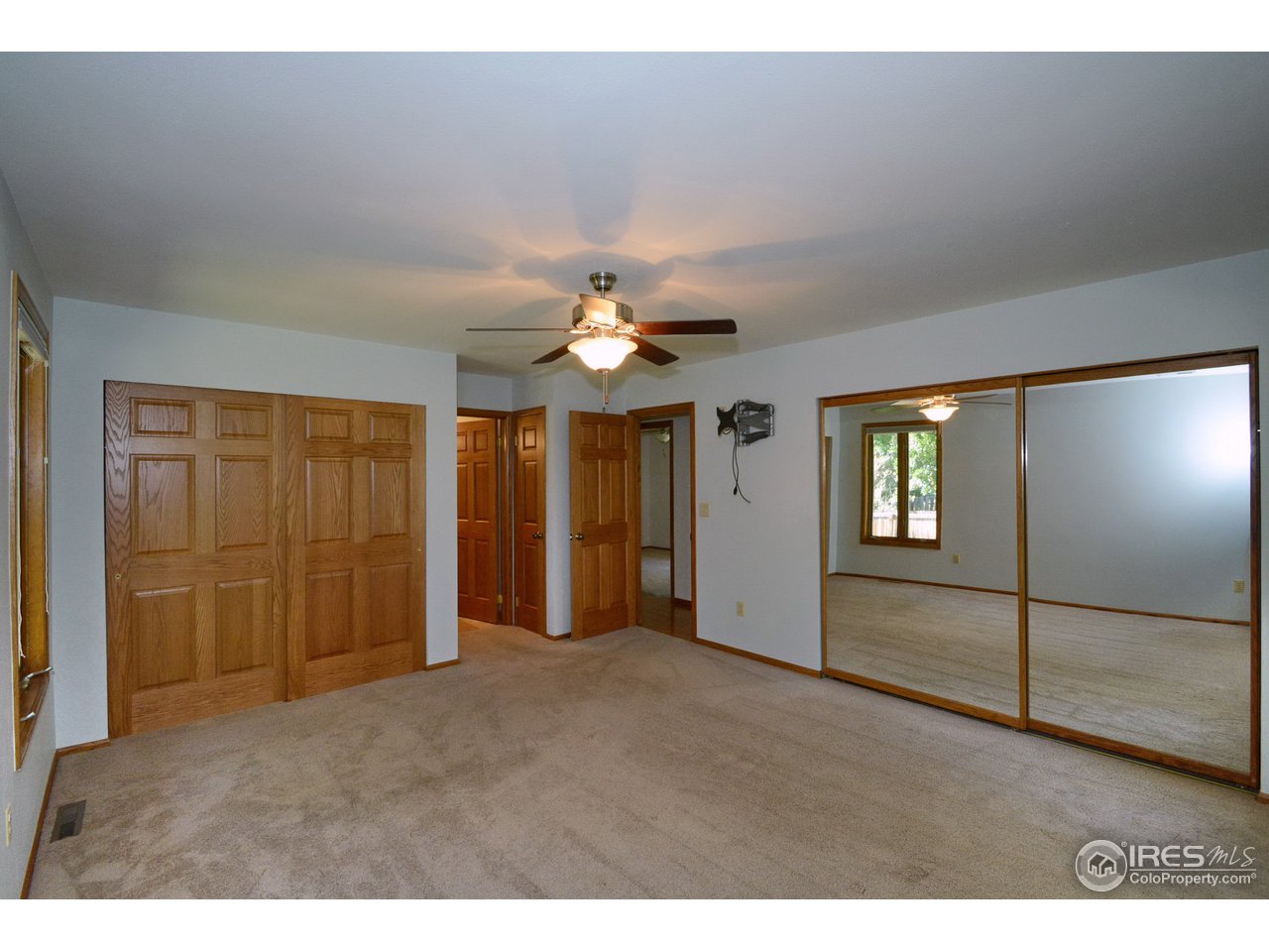 7135 Lookout Road Longmont, CO 80503 - Photo 14 of 24 master bedroom w/ 2 closets