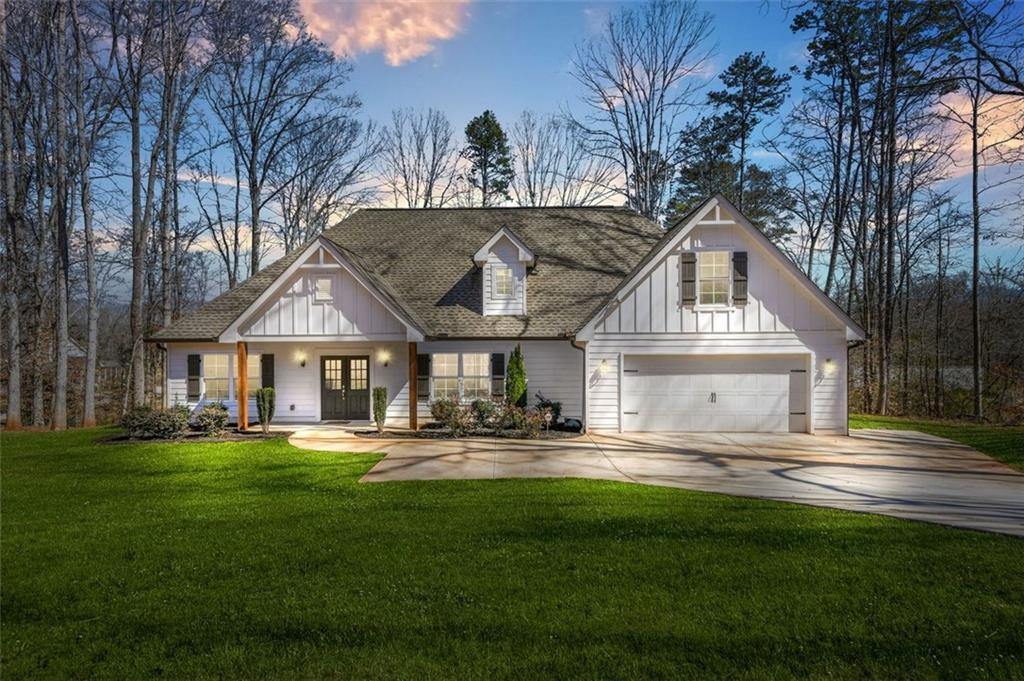 a front view of a house with a yard