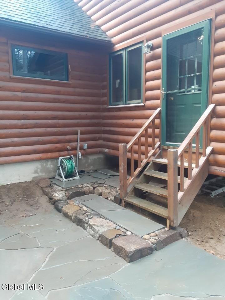 391 Antler Lake Road Johnsburg, NY 12886 - Photo 17 of 46 back steps to sun room