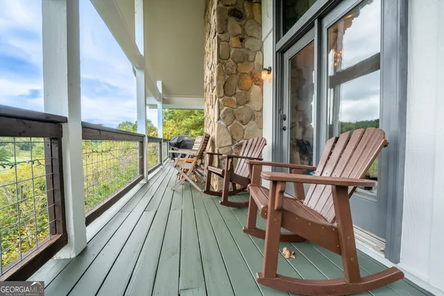 a living room with furniture and a gate