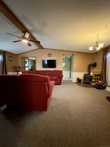 a stove top oven sitting inside of a kitchen