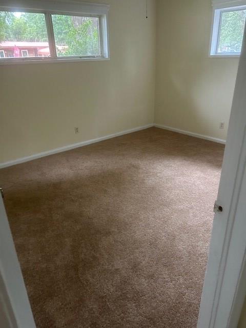 2727 Rice Street Columbus, GA 31903 - Photo 2 of 5 an empty room with a window