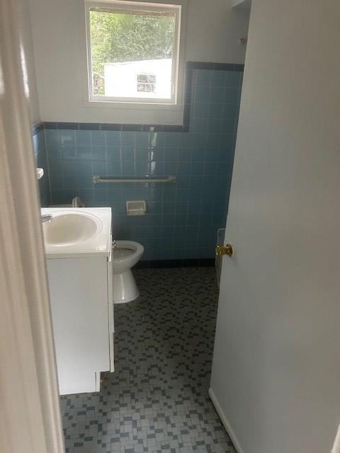 2727 Rice Street Columbus, GA 31903 - Photo 3 of 5 a bathroom with a sink and a toilet