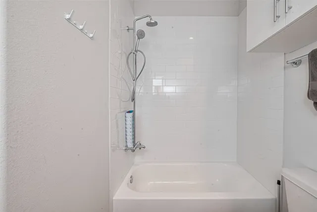 a close up of a bathtub in a bathroom