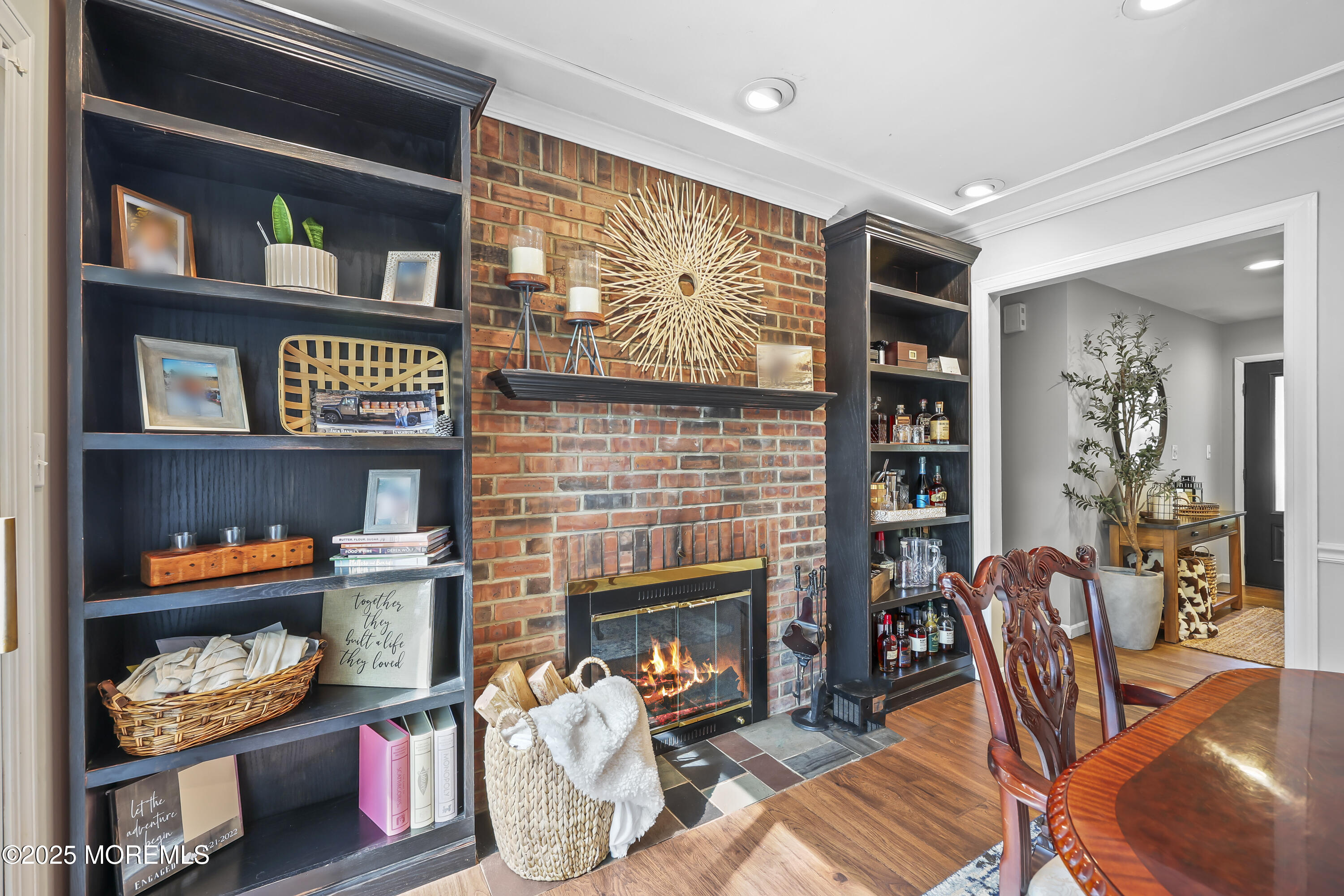 91 Newbury Road Howell, NJ 07731 - Photo 13 of 34 a living room with furniture and a fireplace