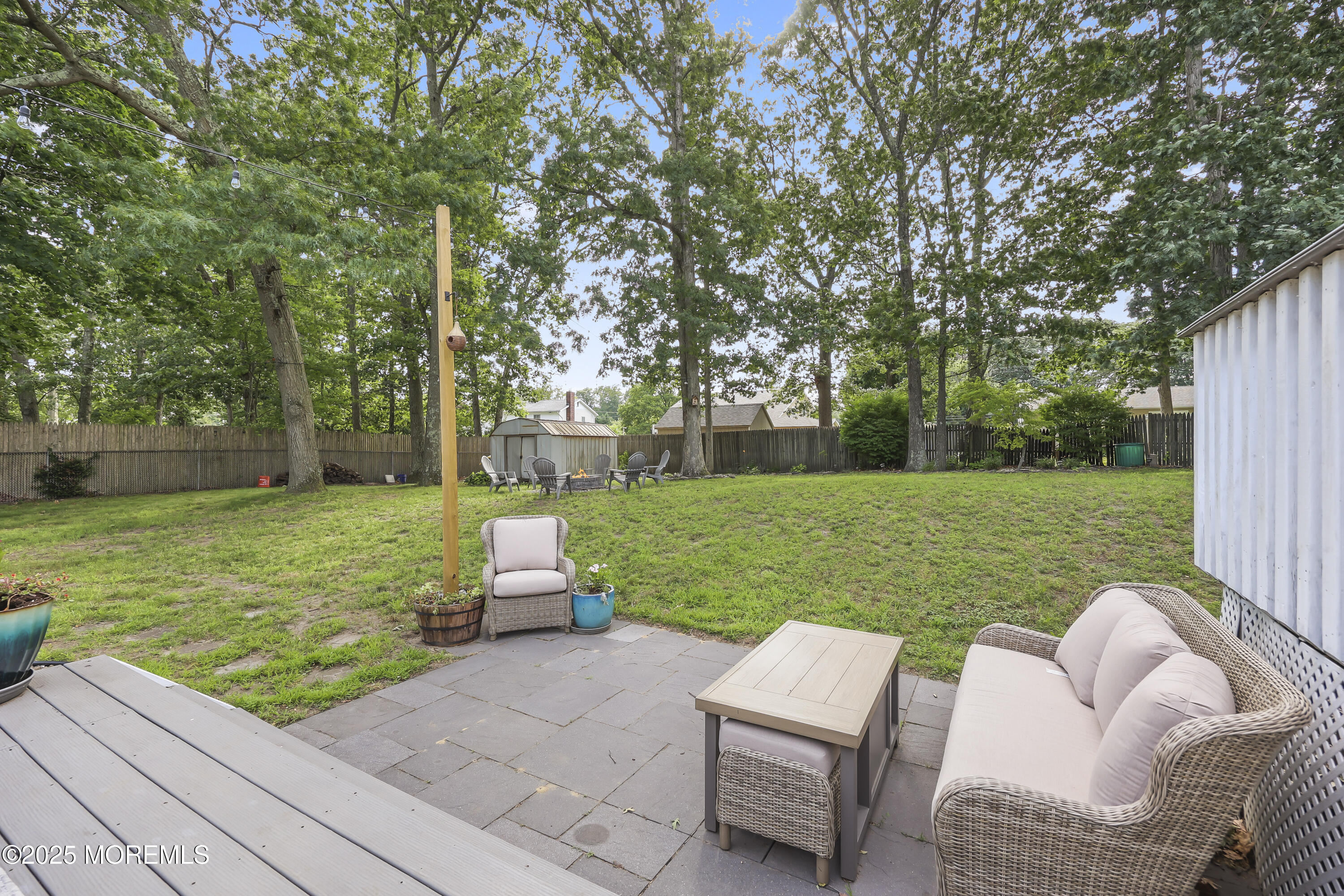 91 Newbury Road Howell, NJ 07731 - Photo 32 of 34 a view of a garden with furniture