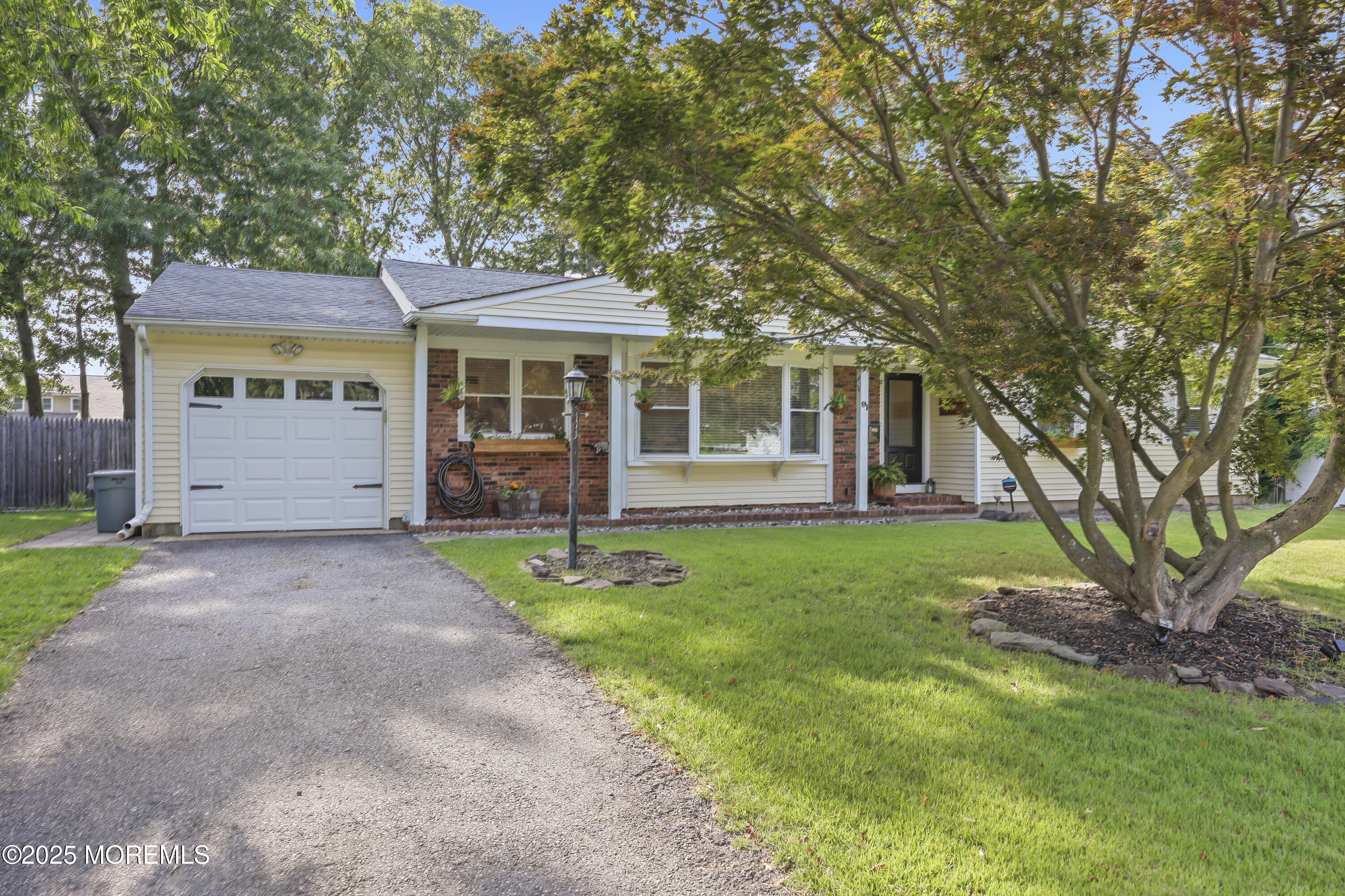 91 Newbury Road Howell, NJ 07731 - Photo 4 of 34 a view of a house with yard and a tree