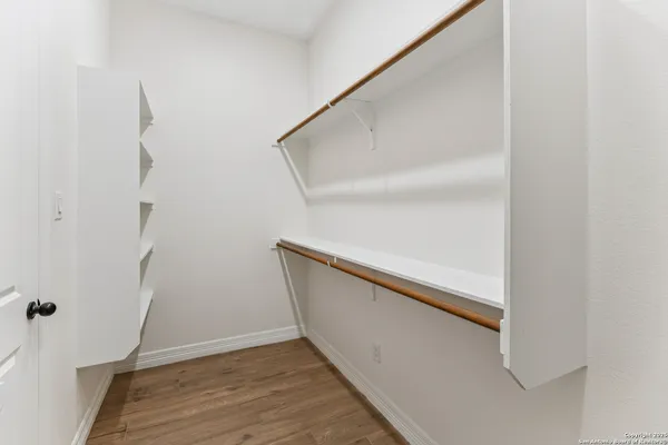 a view of entryway with wooden floor