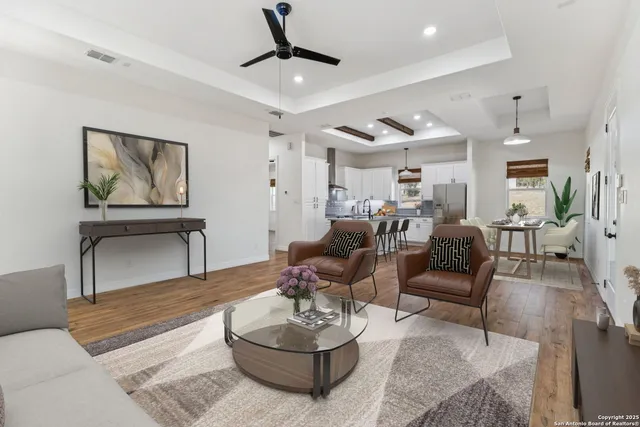 a living room with furniture and a couch