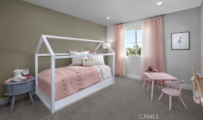 33425 Rusty Court French Valley, CA 92596 - Photo 15 of 25 a bedroom with a bed a table and chair