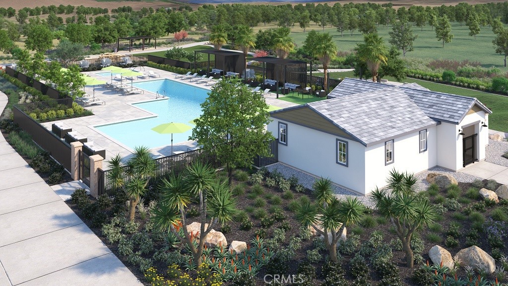 33425 Rusty Court French Valley, CA 92596 - Photo 21 of 25 an aerial view of a house with a yard and lake view