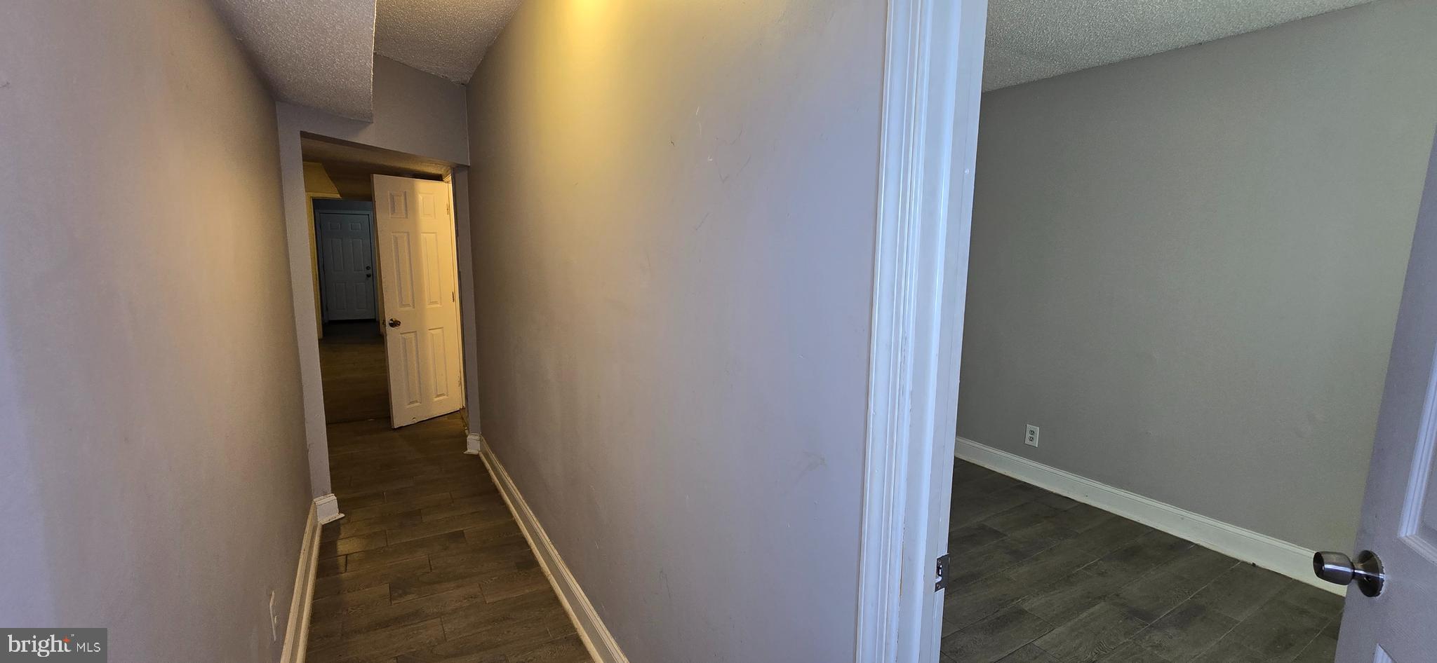 1702 Gales Street Northeast, Unit 3 Washington, DC 20002 - Photo 2 of 13 a view of a hallway with wooden floor