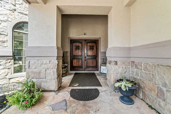 a front view of a house with outdoor space