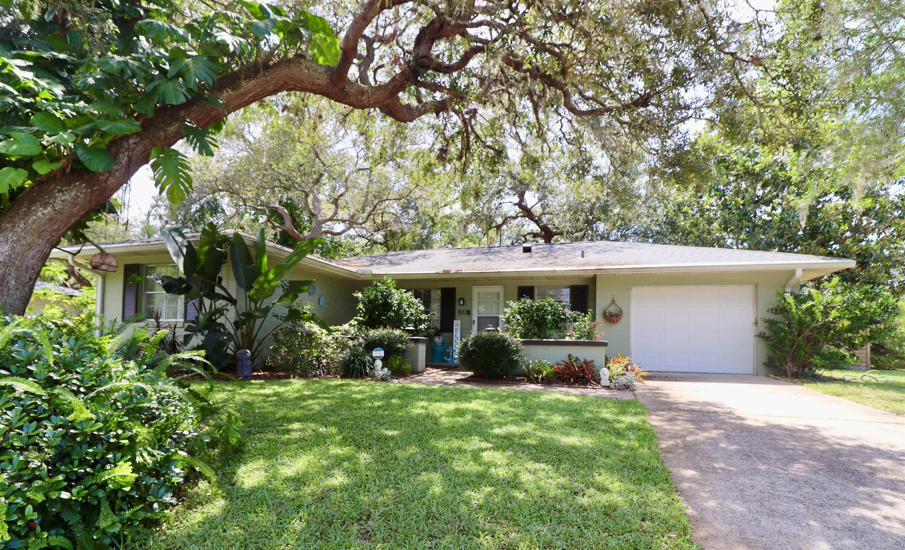 1017 San Remo Road St. Augustine, FL 32086 - Photo 1 of 23 a view of a backyard with garden