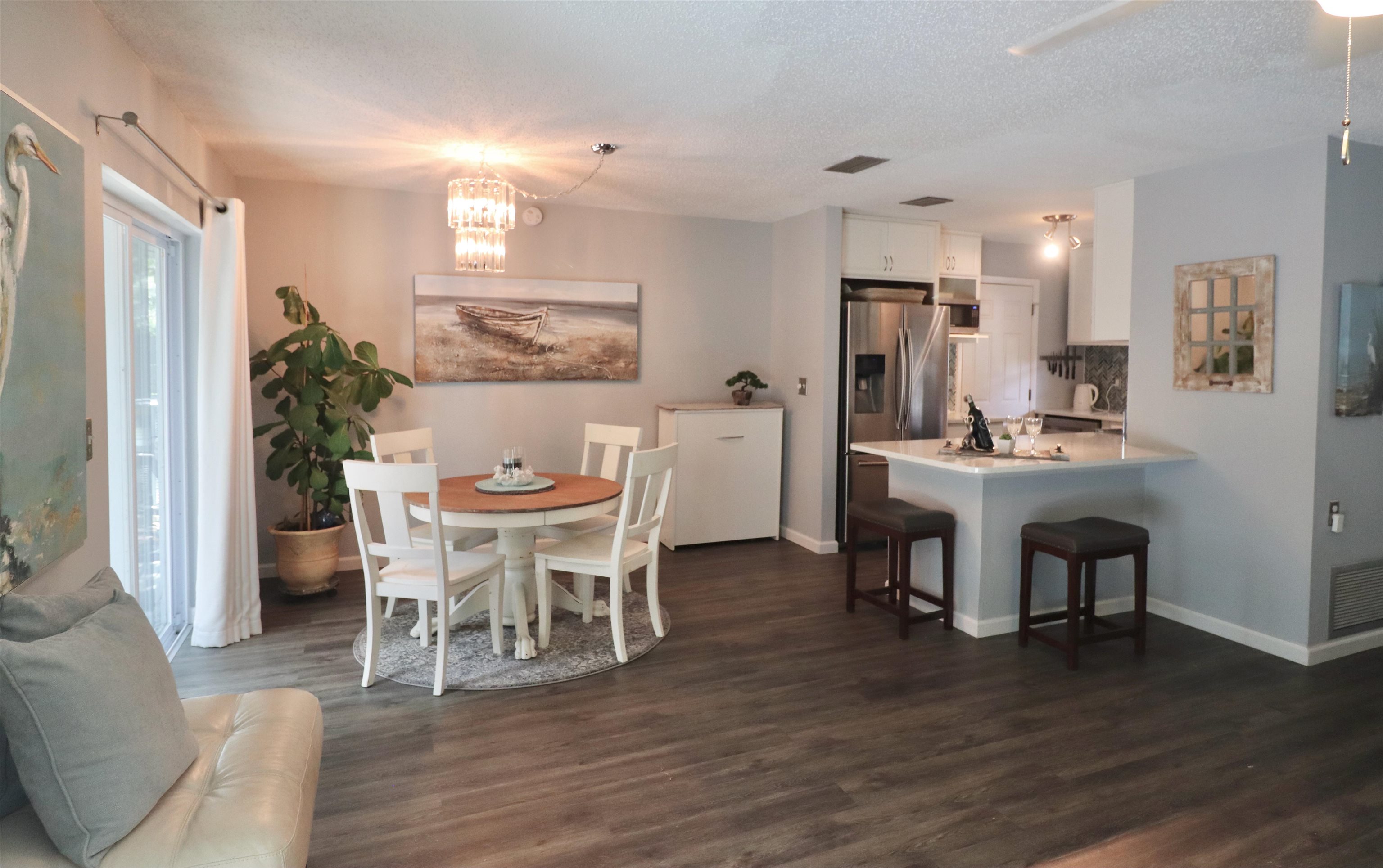 1017 San Remo Road St. Augustine, FL 32086 - Photo 4 of 23 a dining room with furniture and wooden floor