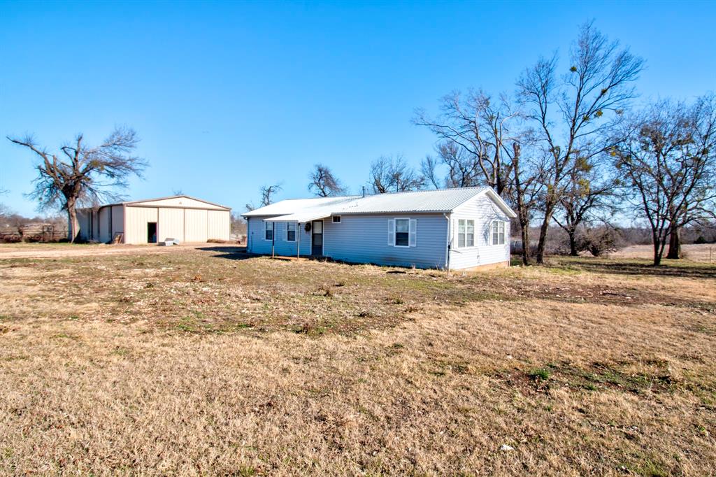 3356 Old Dorchester Road Sherman, TX 75092 - Photo 15 of 22 a view of a house with a yard
