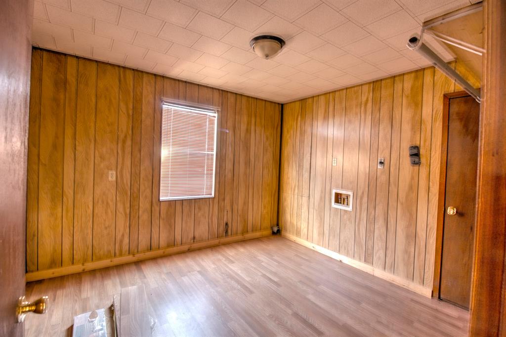 3356 Old Dorchester Road Sherman, TX 75092 - Photo 20 of 22 a view of a room with wooden walls