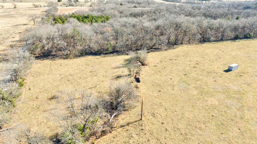 3356 Old Dorchester Road Sherman, TX 75092 - Photo 8 of 22 a view of yard covered in snow