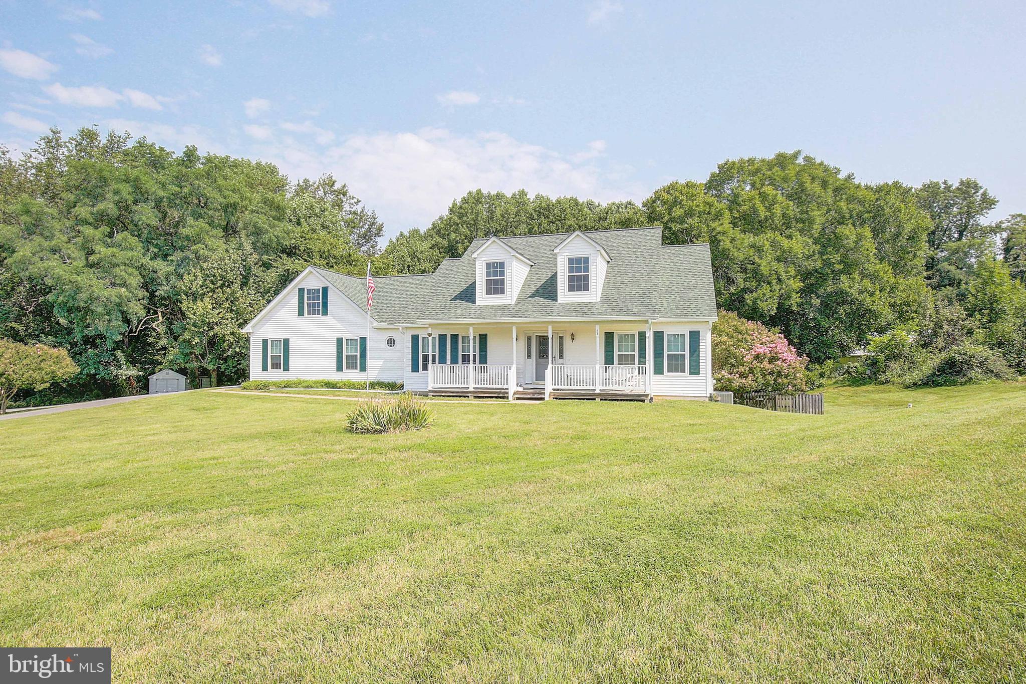4650 Paul Hance Road Huntingtown, MD 20639 - Photo 55 of 57 a front view of a house with swimming pool