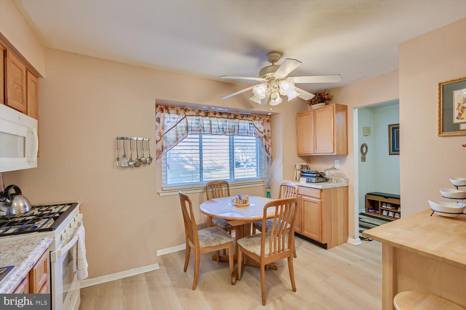 806 Robin Road Hillsborough, NJ 08844 - Photo 14 of 37 a view of a dining room with furniture and a chandelier