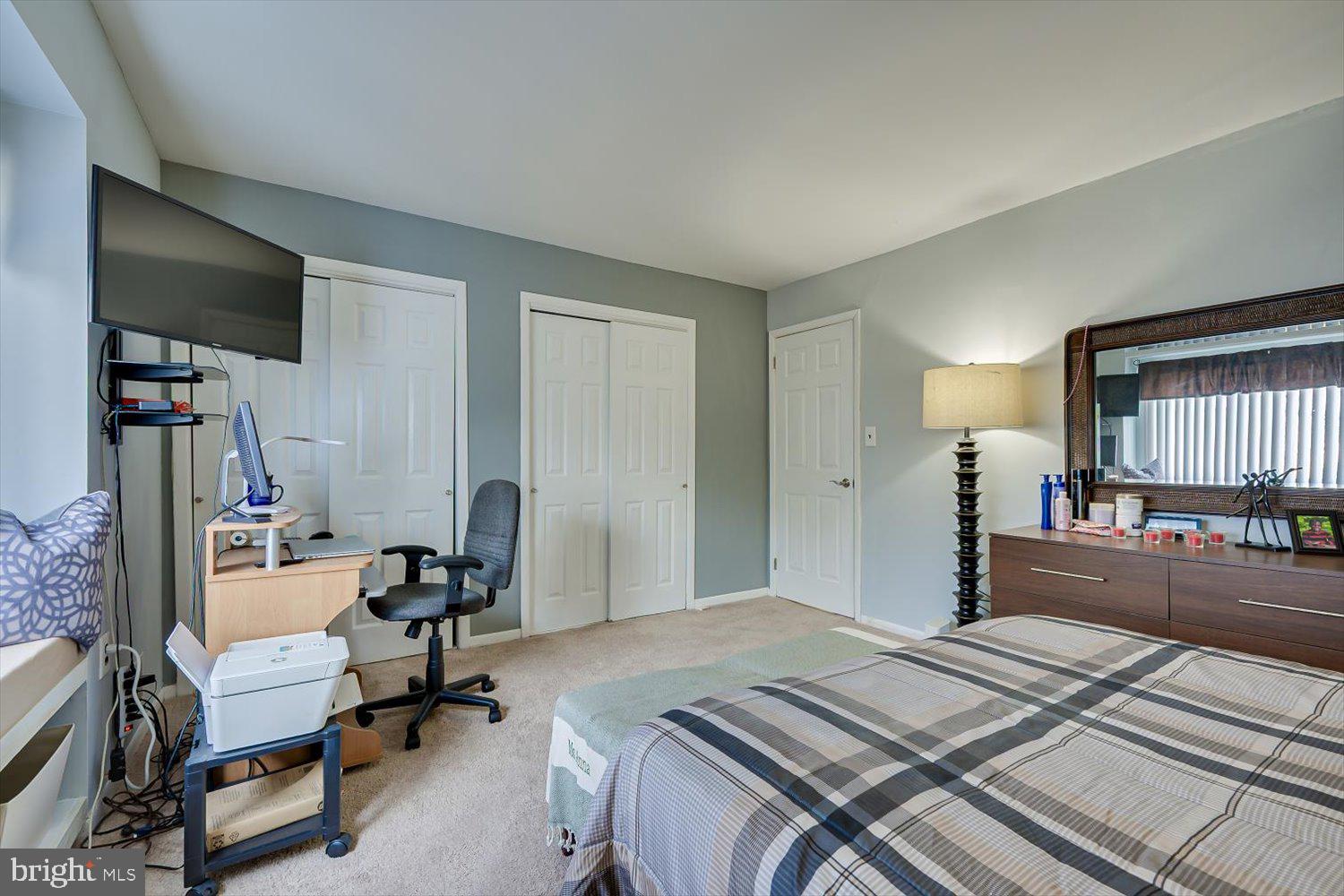 806 Robin Road Hillsborough, NJ 08844 - Photo 23 of 37 a bedroom with bed and a chair