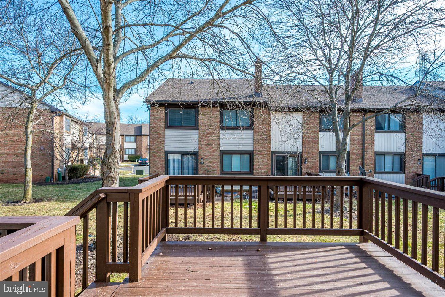 806 Robin Road Hillsborough, NJ 08844 - Photo 29 of 37 a view of a wooden deck and a yard