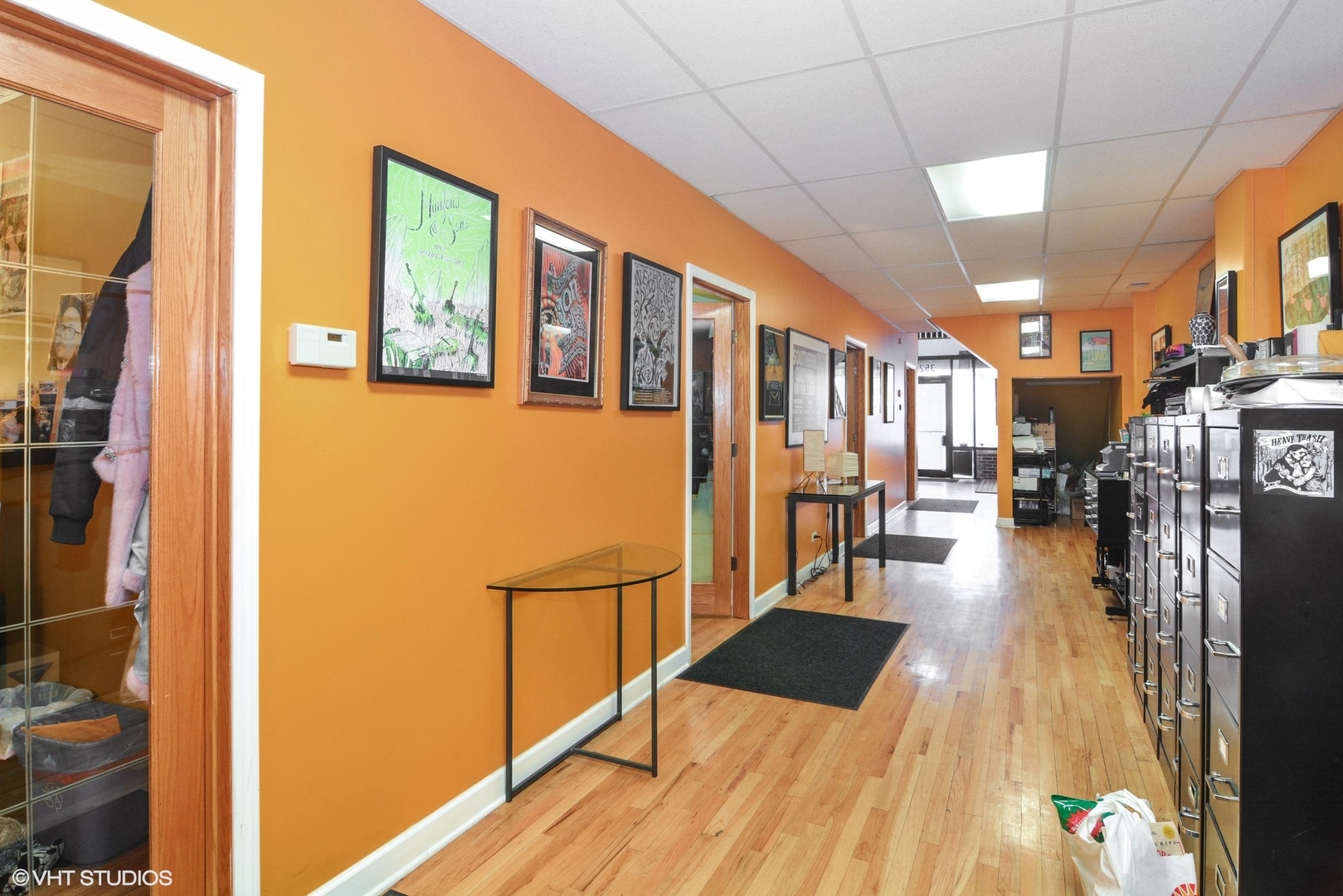 3522 West Armitage Avenue Chicago, IL 60647 - Photo 15 of 18 a hallway with a large window and wooden floor