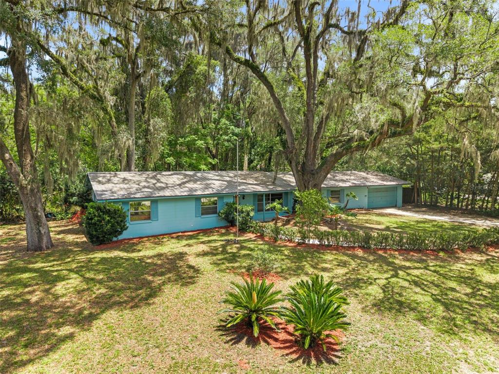 4825 Southwest 19th Street Gainesville, FL 32608 - Photo 35 of 40 a view of a house with a yard