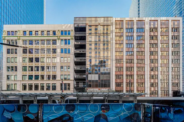 a front view of a building with balcony