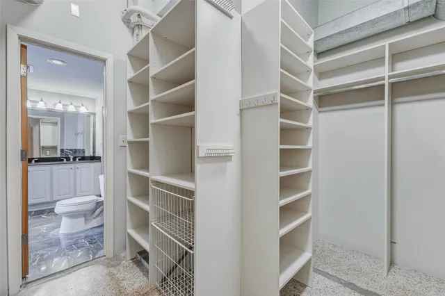 a view of an empty walk in closet