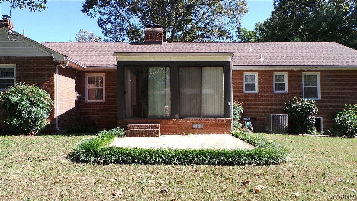 4888 Burnham Road North Chesterfield, VA 23234 - Photo 3 of 17 a view of a house with a yard