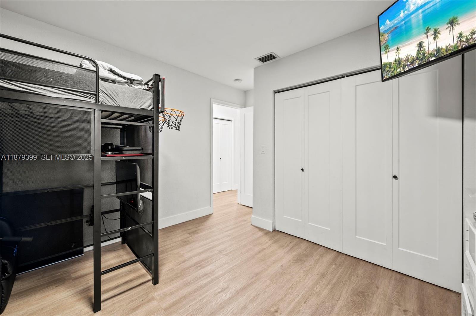 17611 Southwest 66th Street Southwest Ranches, FL 33331 - Photo 19 of 45 a view of a room with wooden floor