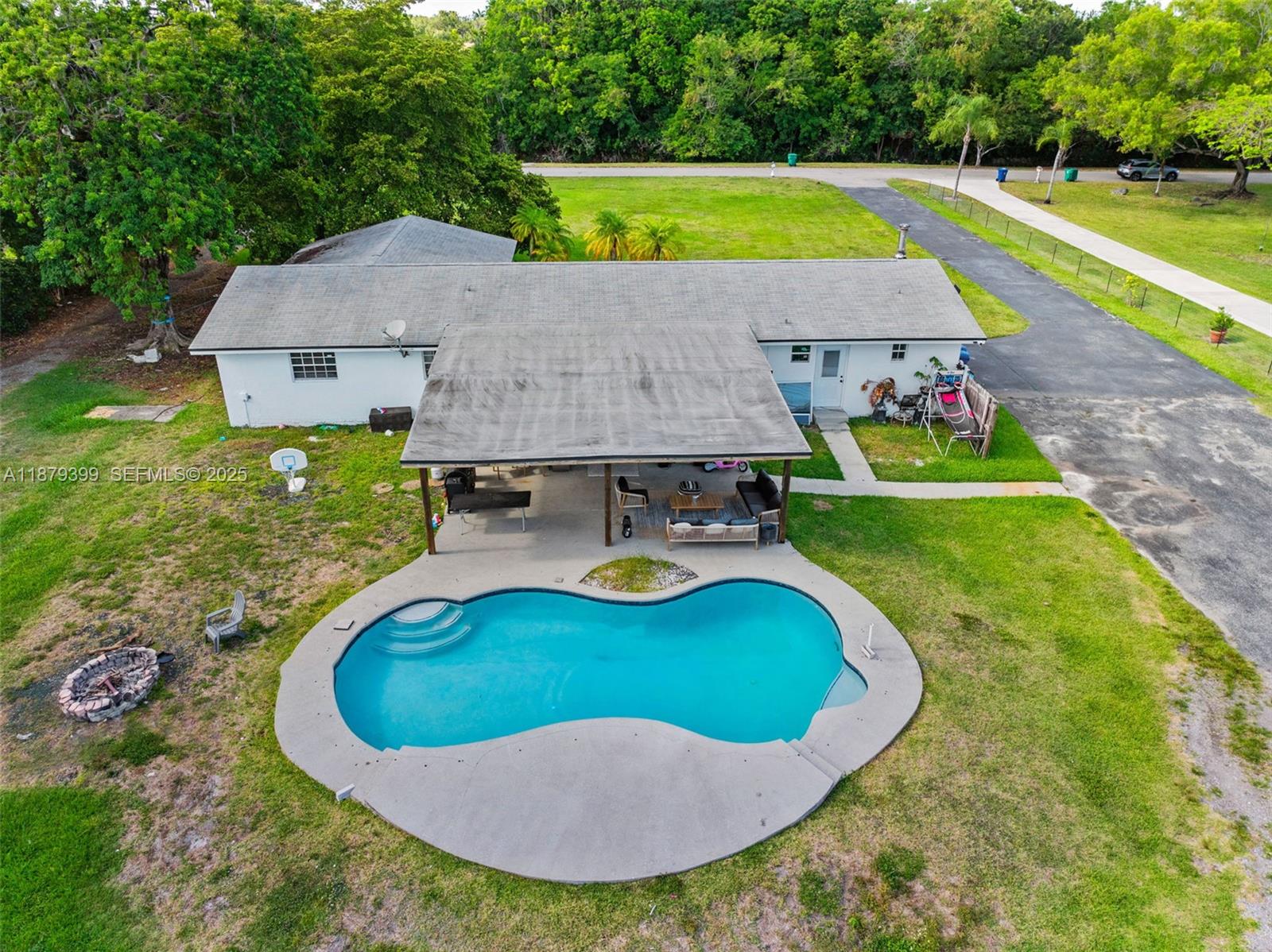 17611 Southwest 66th Street Southwest Ranches, FL 33331 - Photo 28 of 45 an aerial view of a house with swimming pool and yard