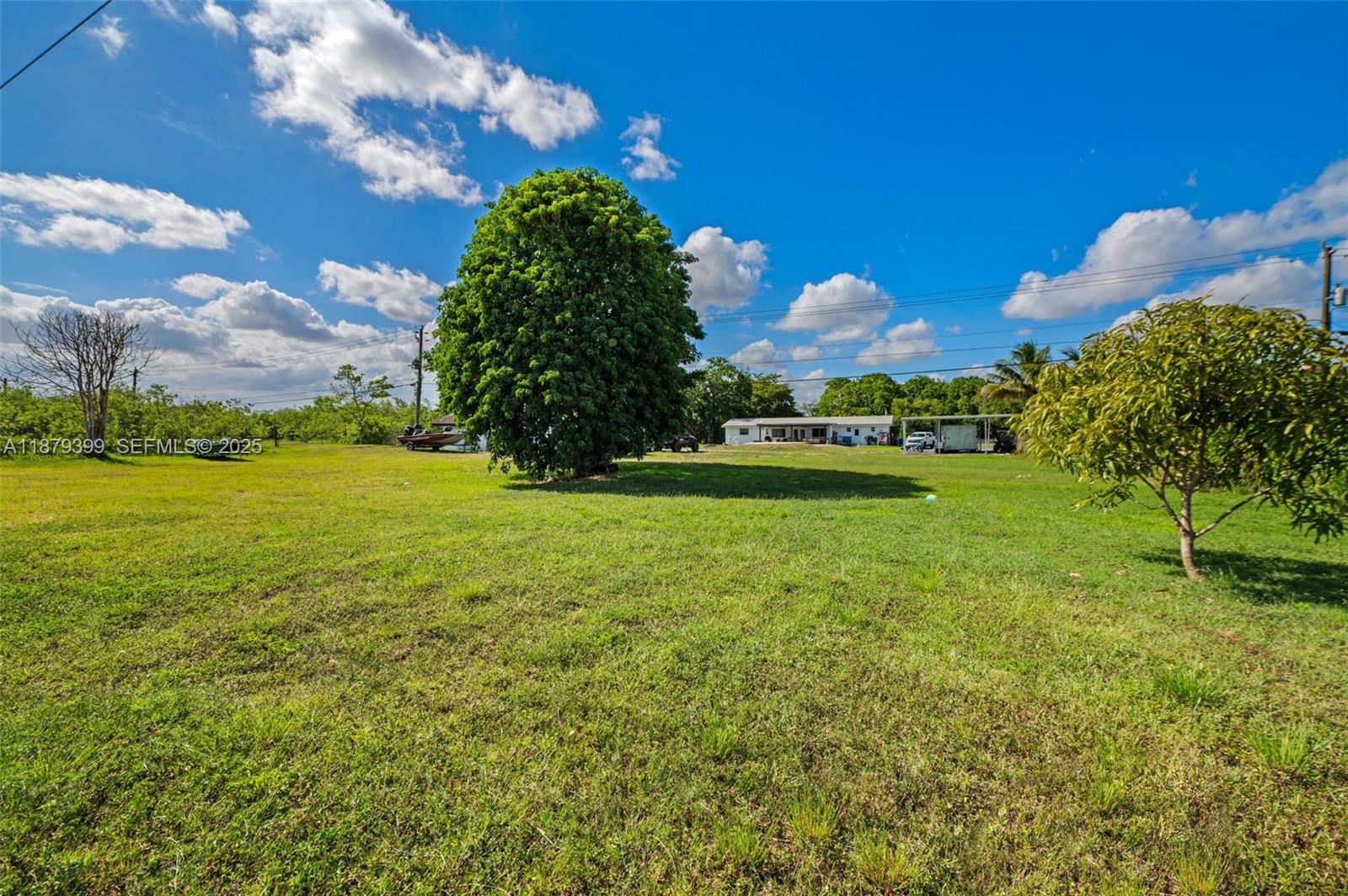 17611 Southwest 66th Street Southwest Ranches, FL 33331 - Photo 32 of 45 a view of a golf course with a big yard