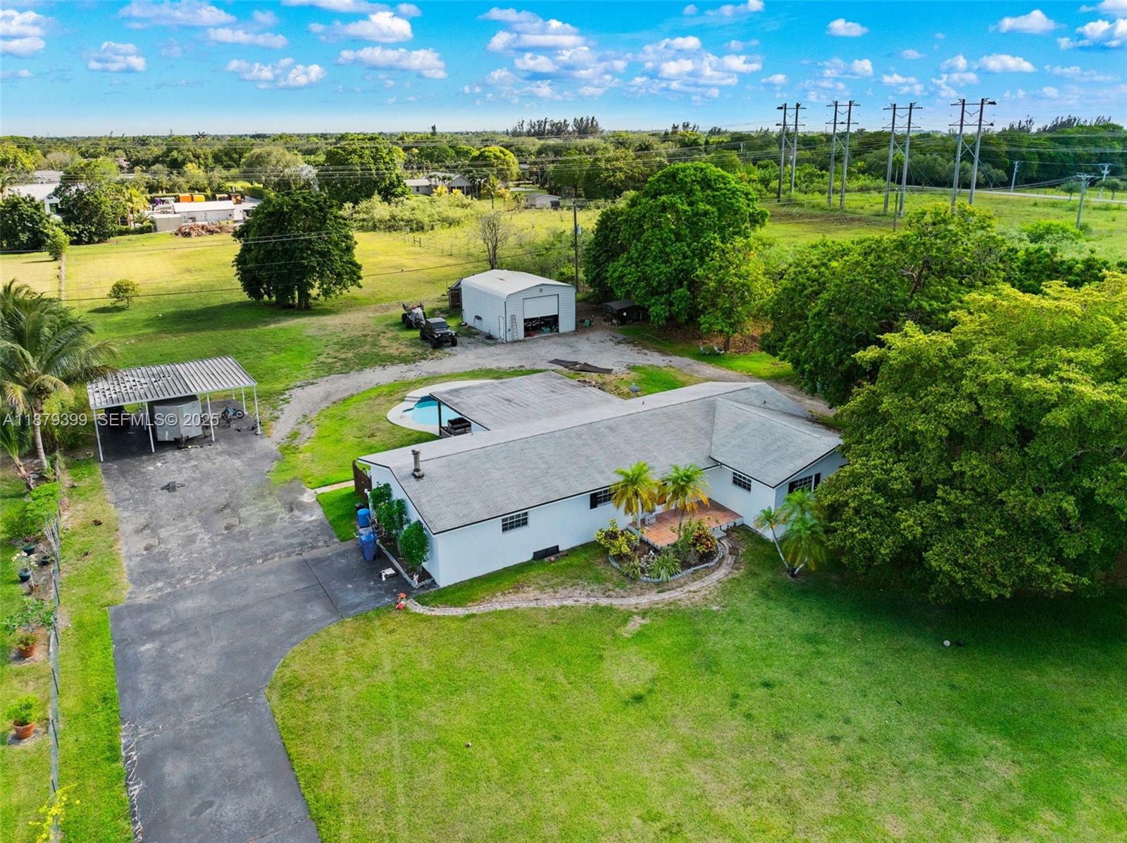 17611 Southwest 66th Street Southwest Ranches, FL 33331 - Photo 33 of 45 an aerial view of a house with garden space and outdoor seating