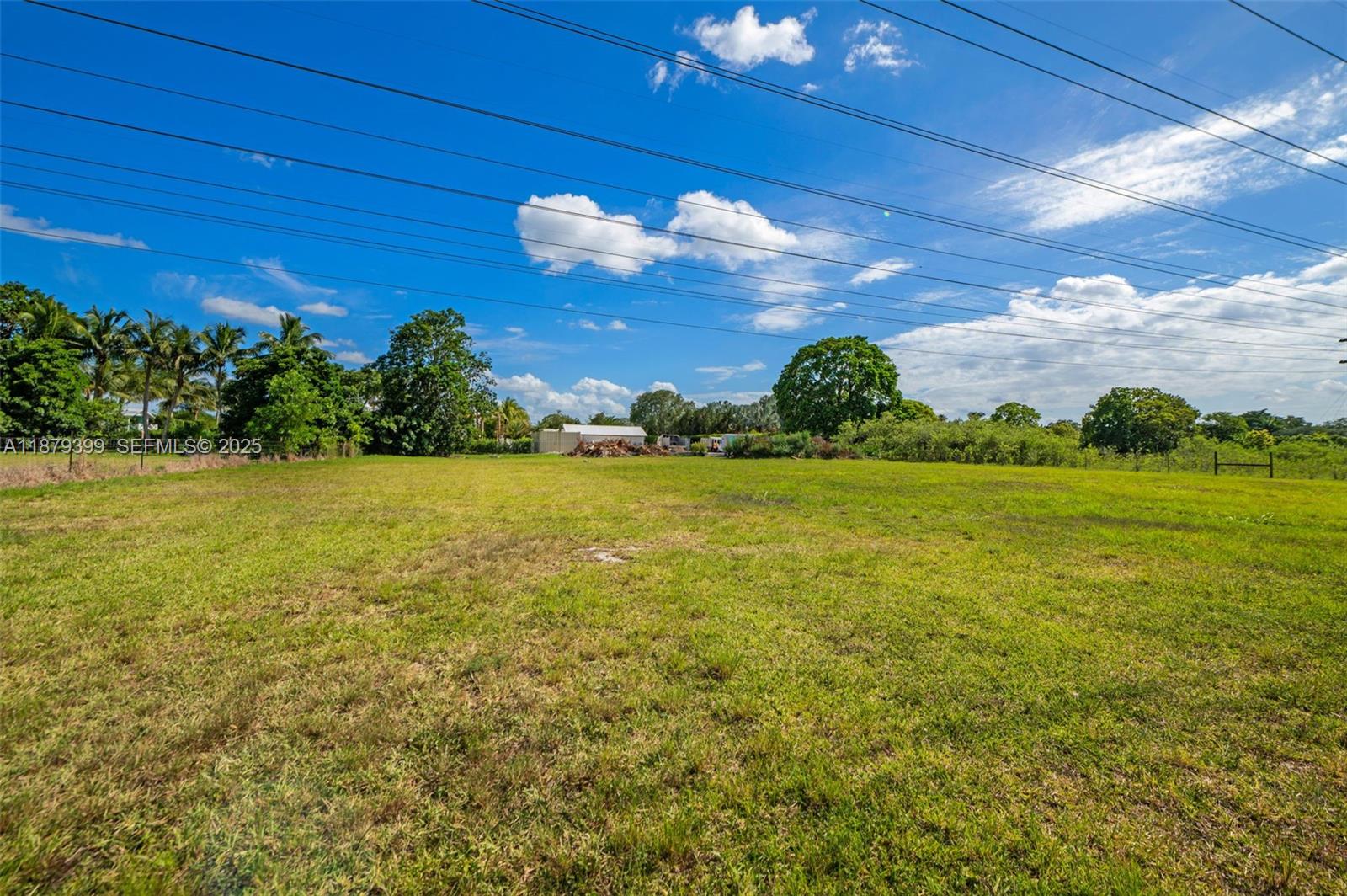 17611 Southwest 66th Street Southwest Ranches, FL 33331 - Photo 36 of 45 a view of a lake with a big yard