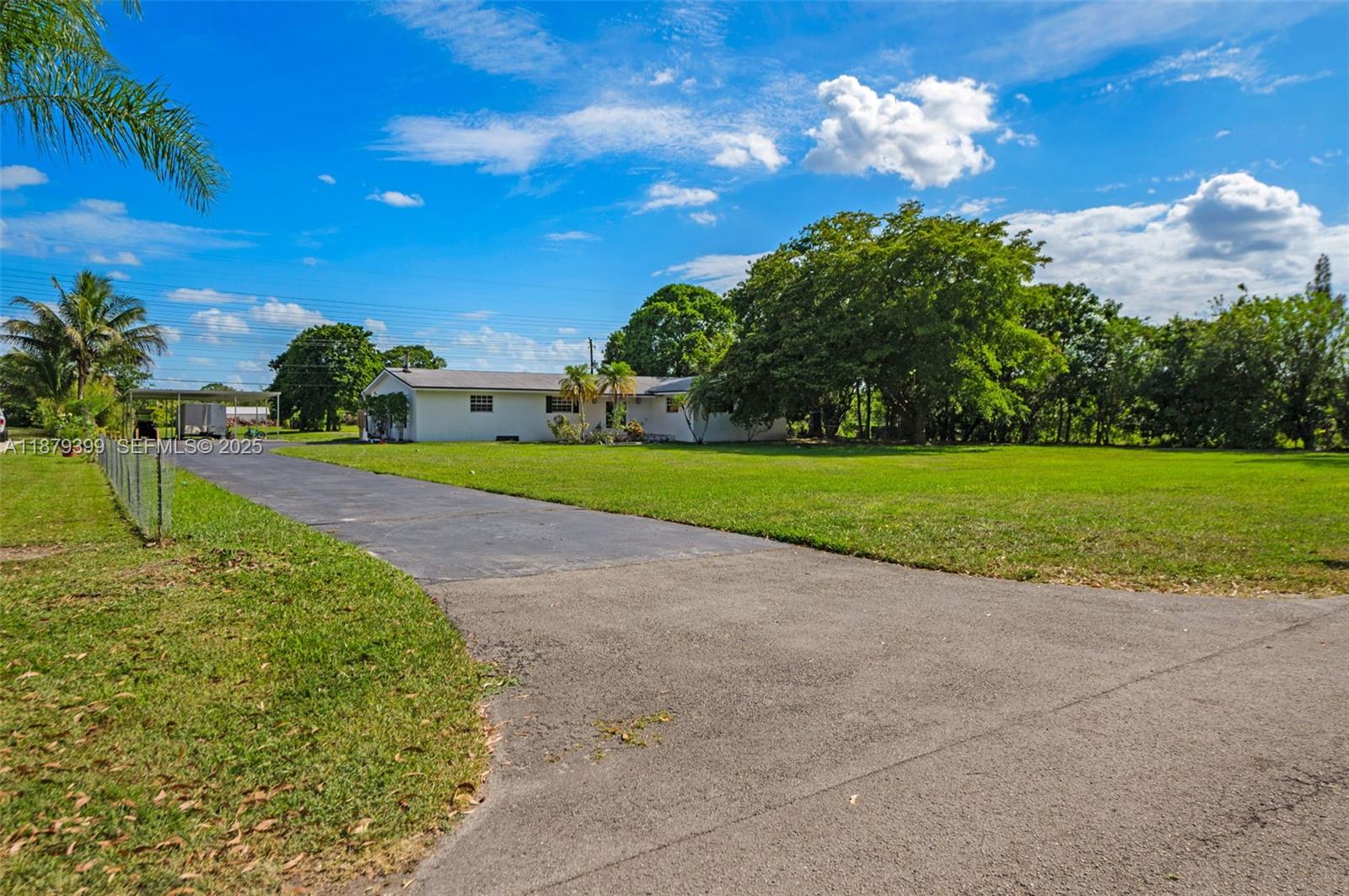 17611 Southwest 66th Street Southwest Ranches, FL 33331 - Photo 37 of 45 a view of a golf course with a garden