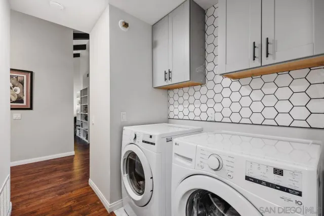 a utility room with dryer and washer