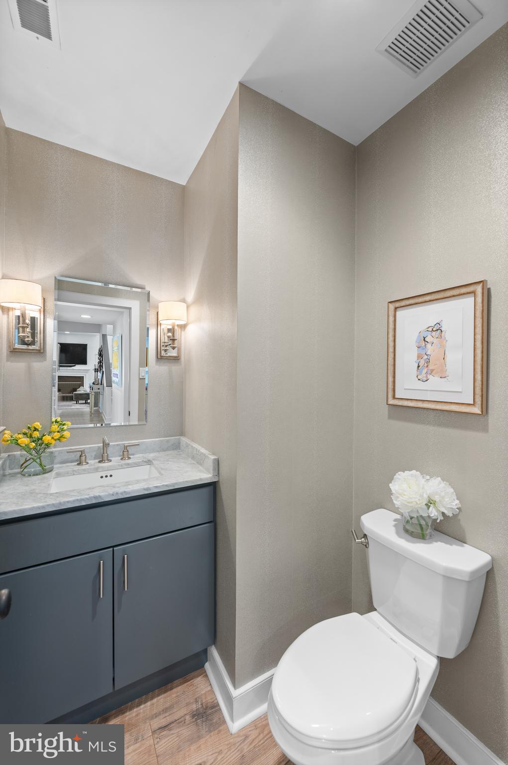 21 Greythorne Woods Circle Wayne, PA 19087 - Photo 9 of 22 a bathroom with a toilet a sink and mirror