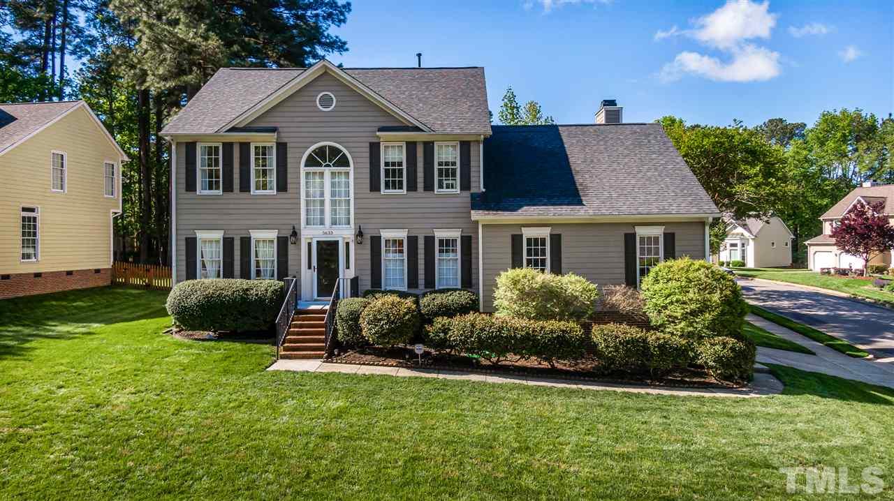 5633 Raddington Street Raleigh, NC 27613 - Photo 1 of 25 a front view of a house with a garden