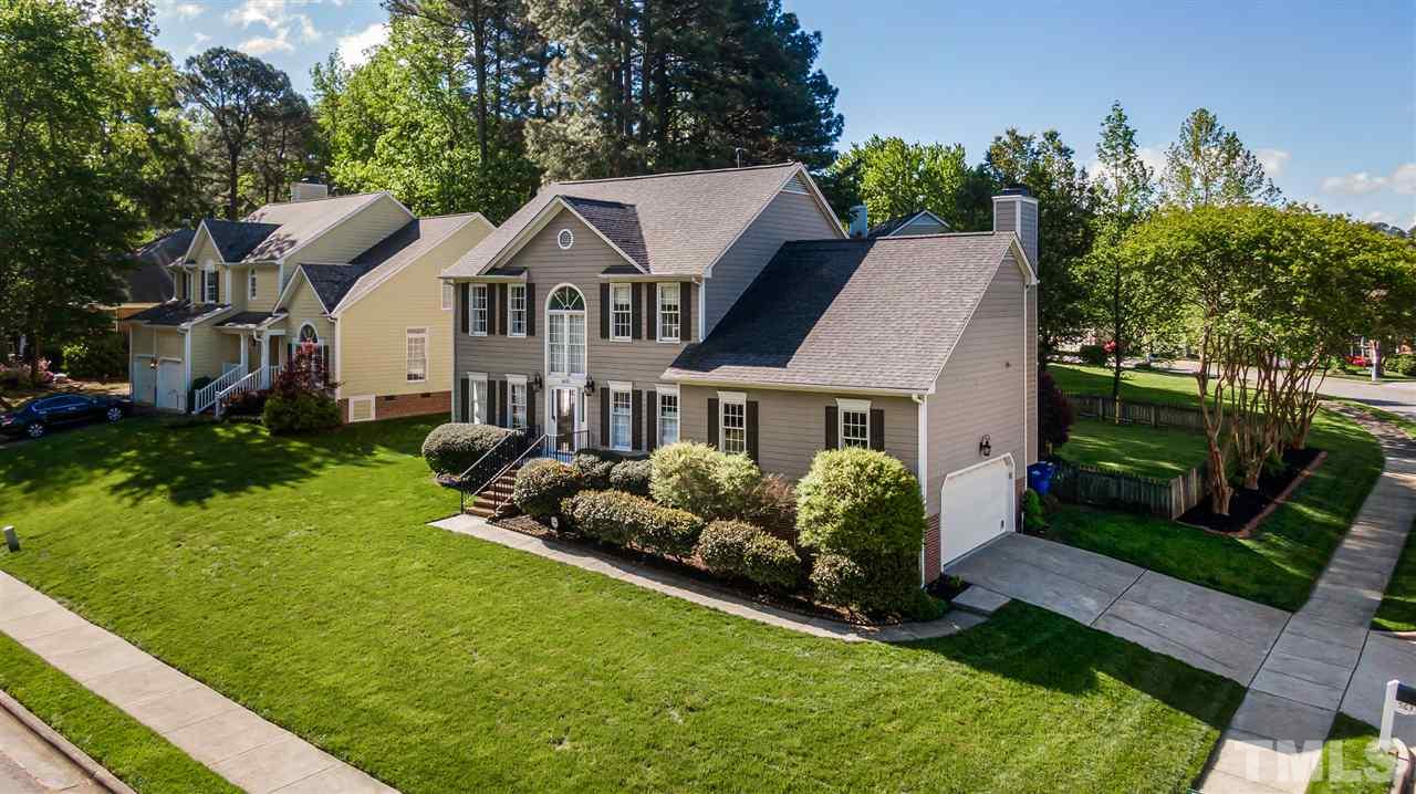 5633 Raddington Street Raleigh, NC 27613 - Photo 2 of 25 a front view of a house with garden