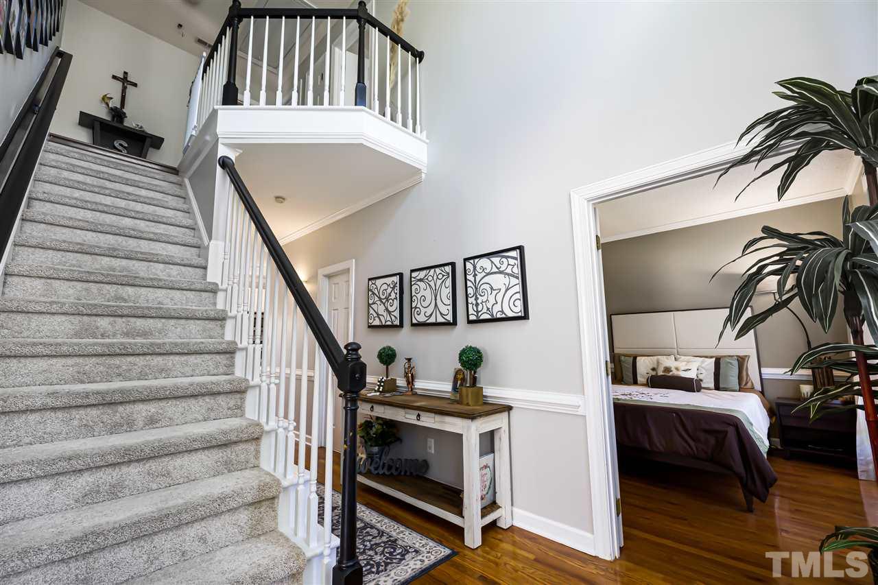 5633 Raddington Street Raleigh, NC 27613 - Photo 3 of 25 a view of entryway and hall