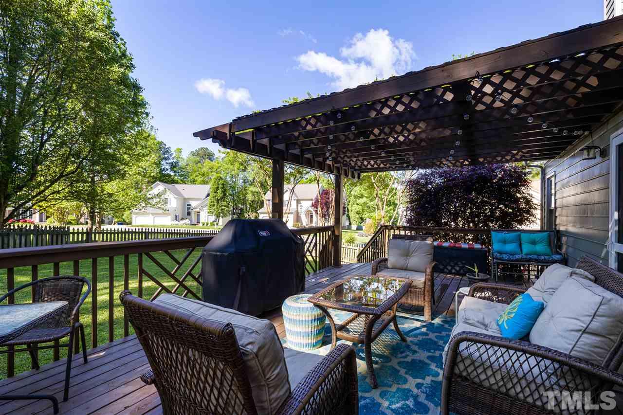 5633 Raddington Street Raleigh, NC 27613 - Photo 21 of 25 a outdoor living space with furniture and garden view