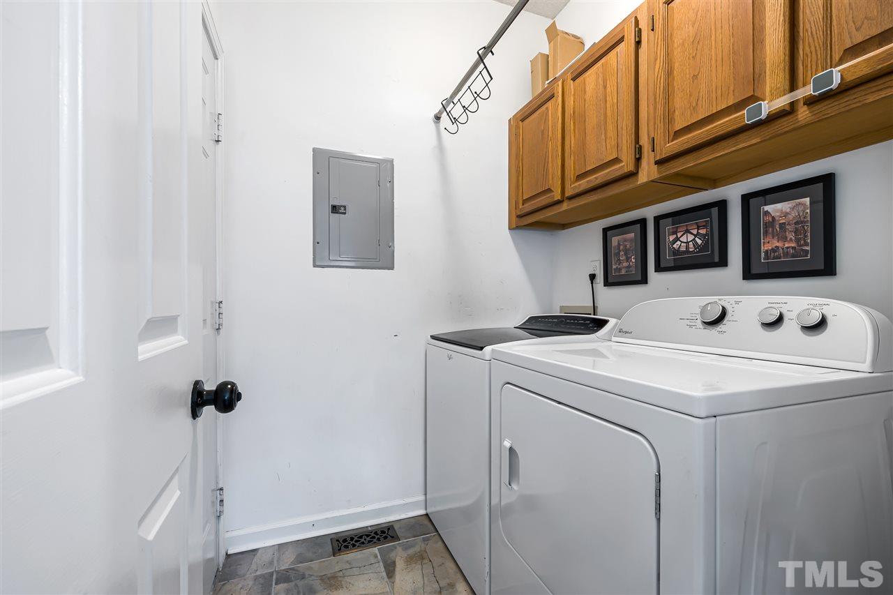 5633 Raddington Street Raleigh, NC 27613 - Photo 23 of 25 a utility room with dryer and washer