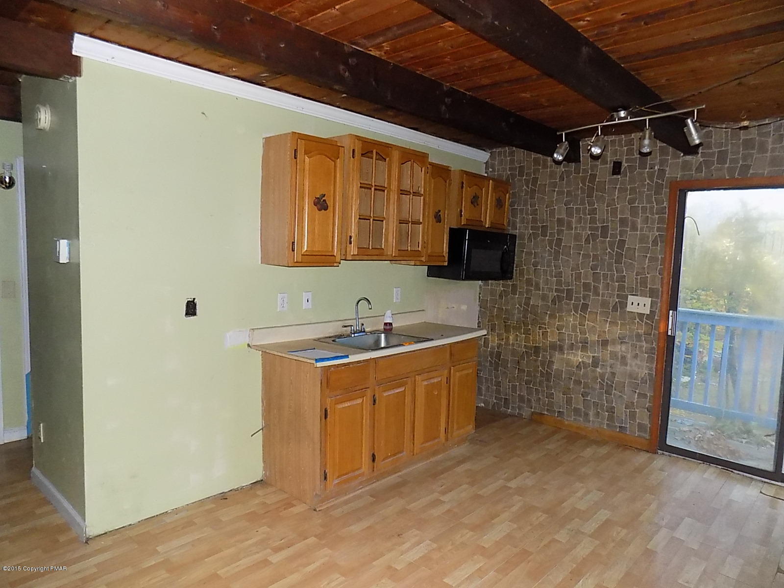 521 Gold Finch Road Bushkill, PA 18324 - Photo 5 of 14 a bathroom with a sink and a mirror